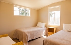 Two single beds in the room - Large Sized Cottage